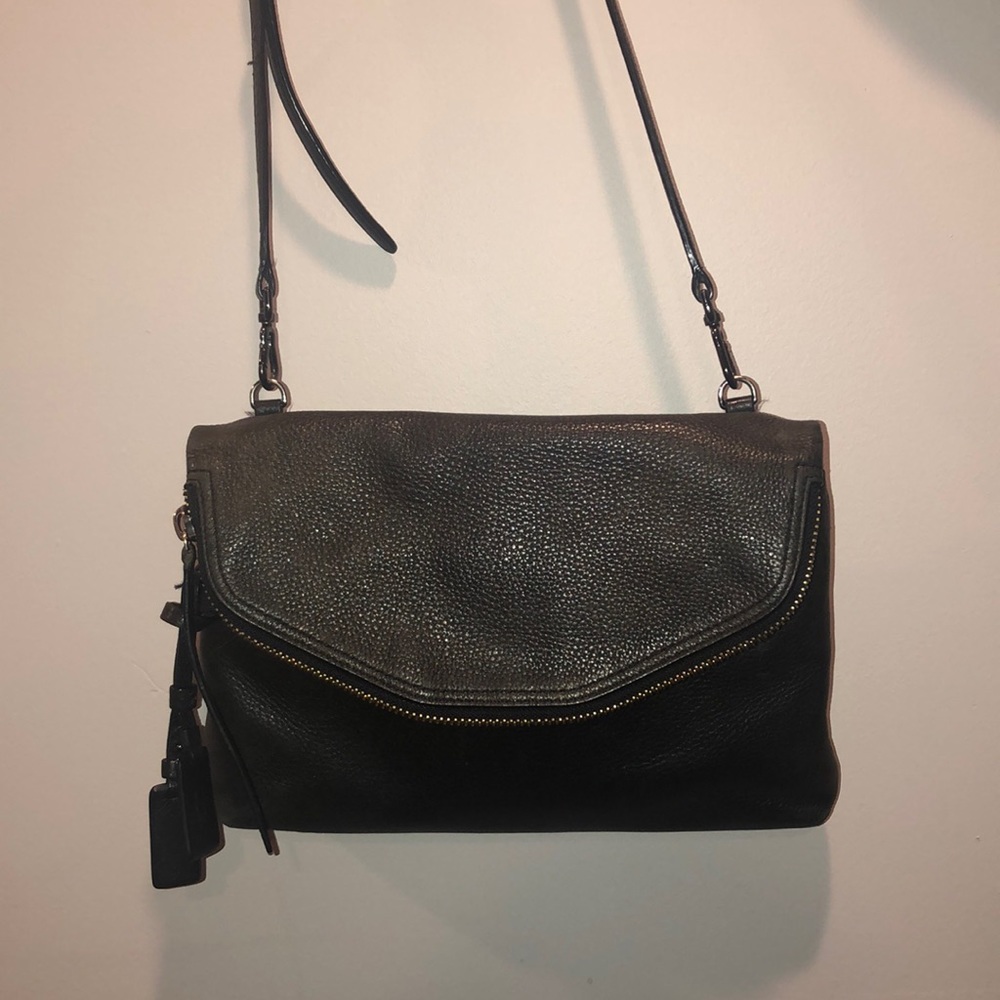 TUMI black leather shoulder purse